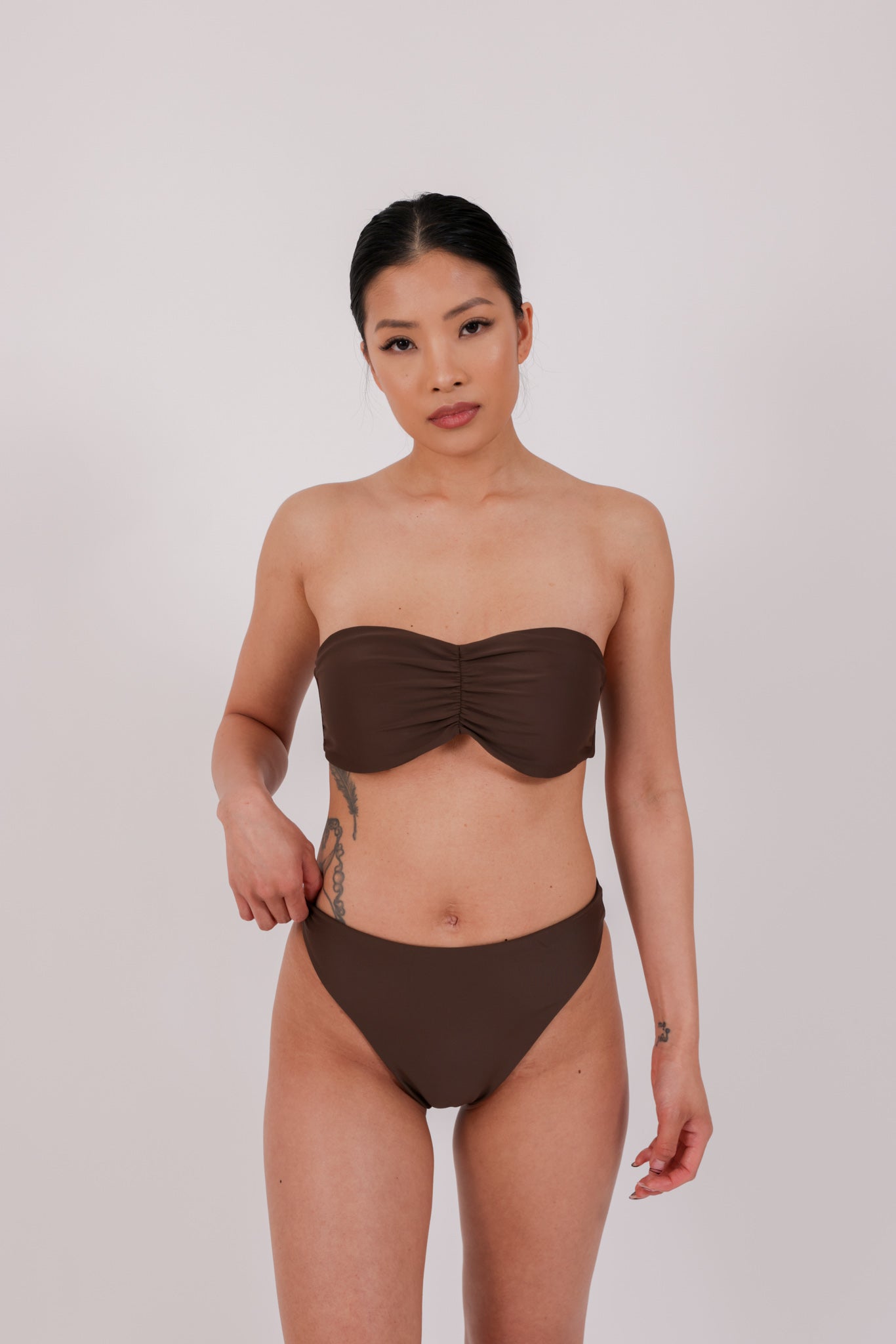 brown strapless bikini in model