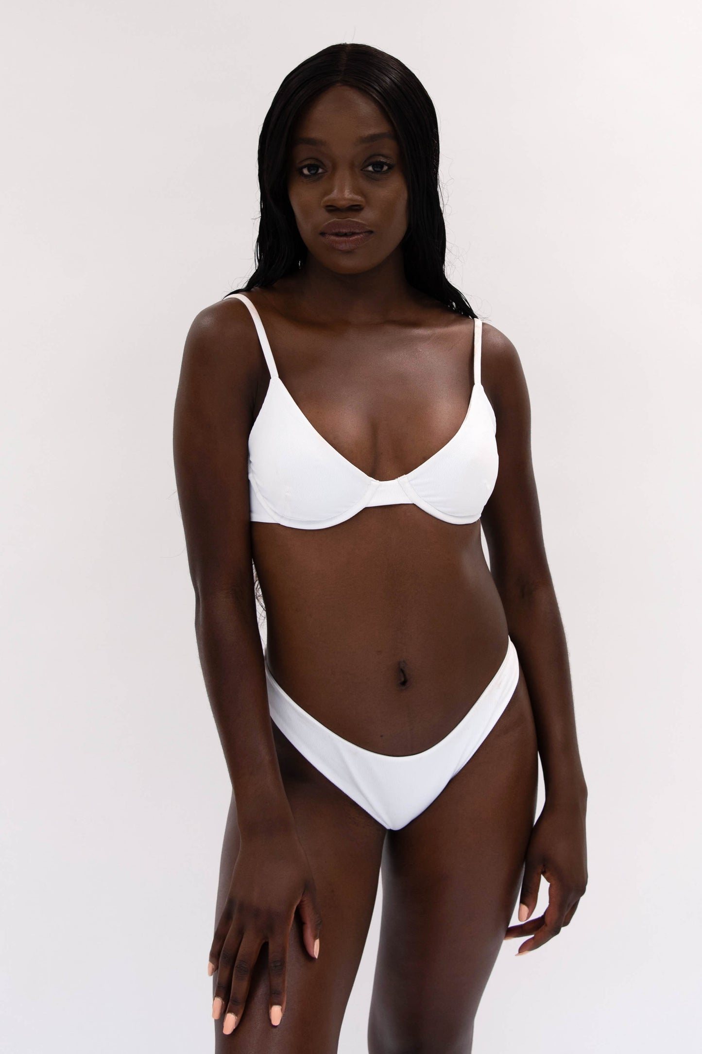 model with white sustainable classy bikini