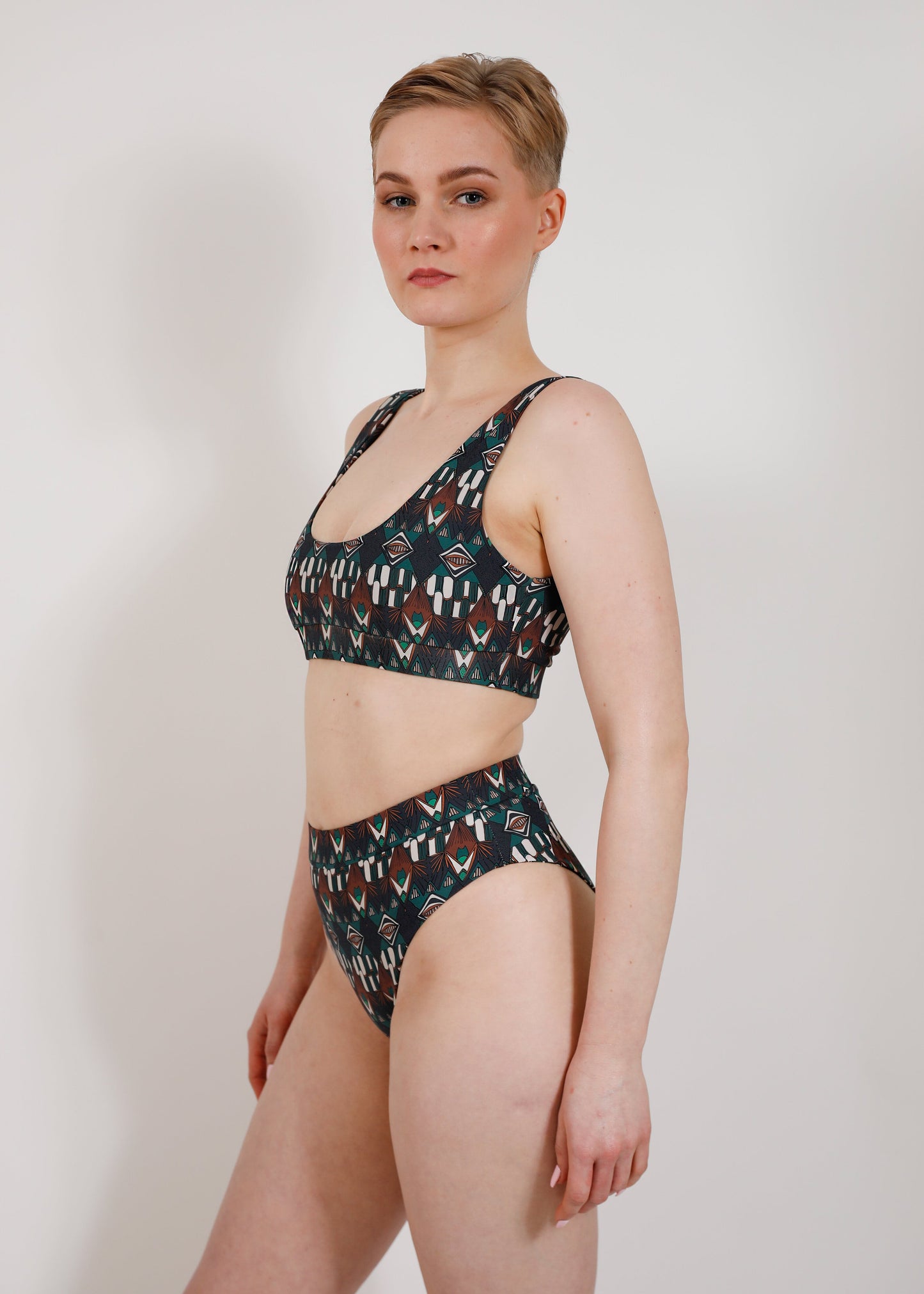 model with sustainable high cut bikini bottom and sporty top