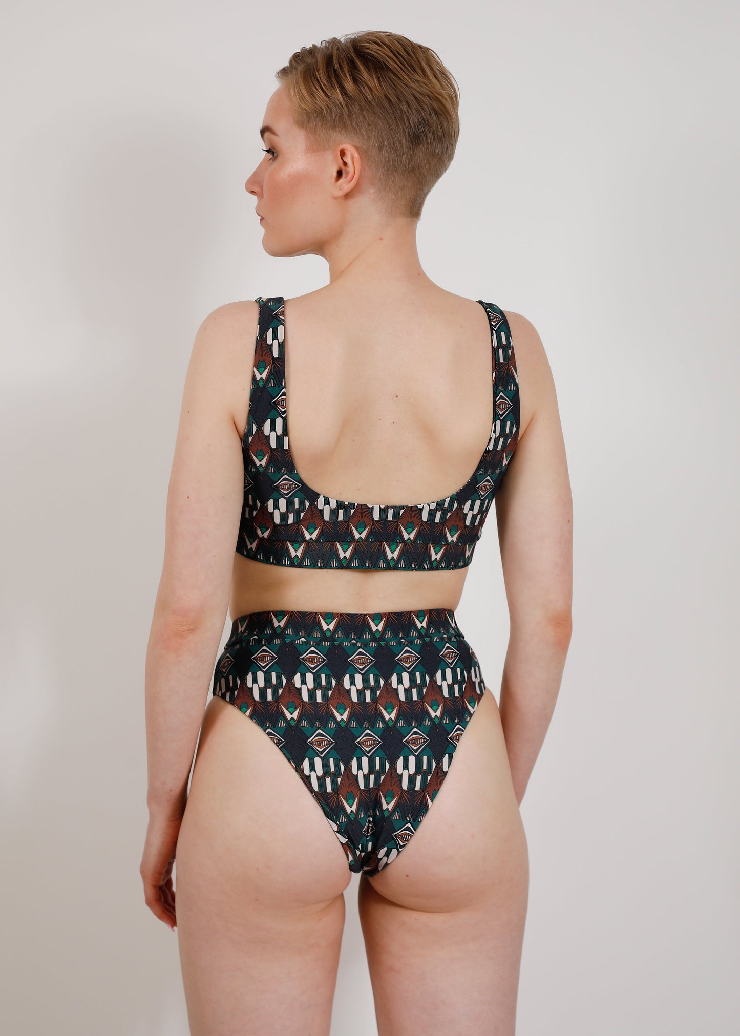 model with sustainable high cut bikini bottom and sporty top