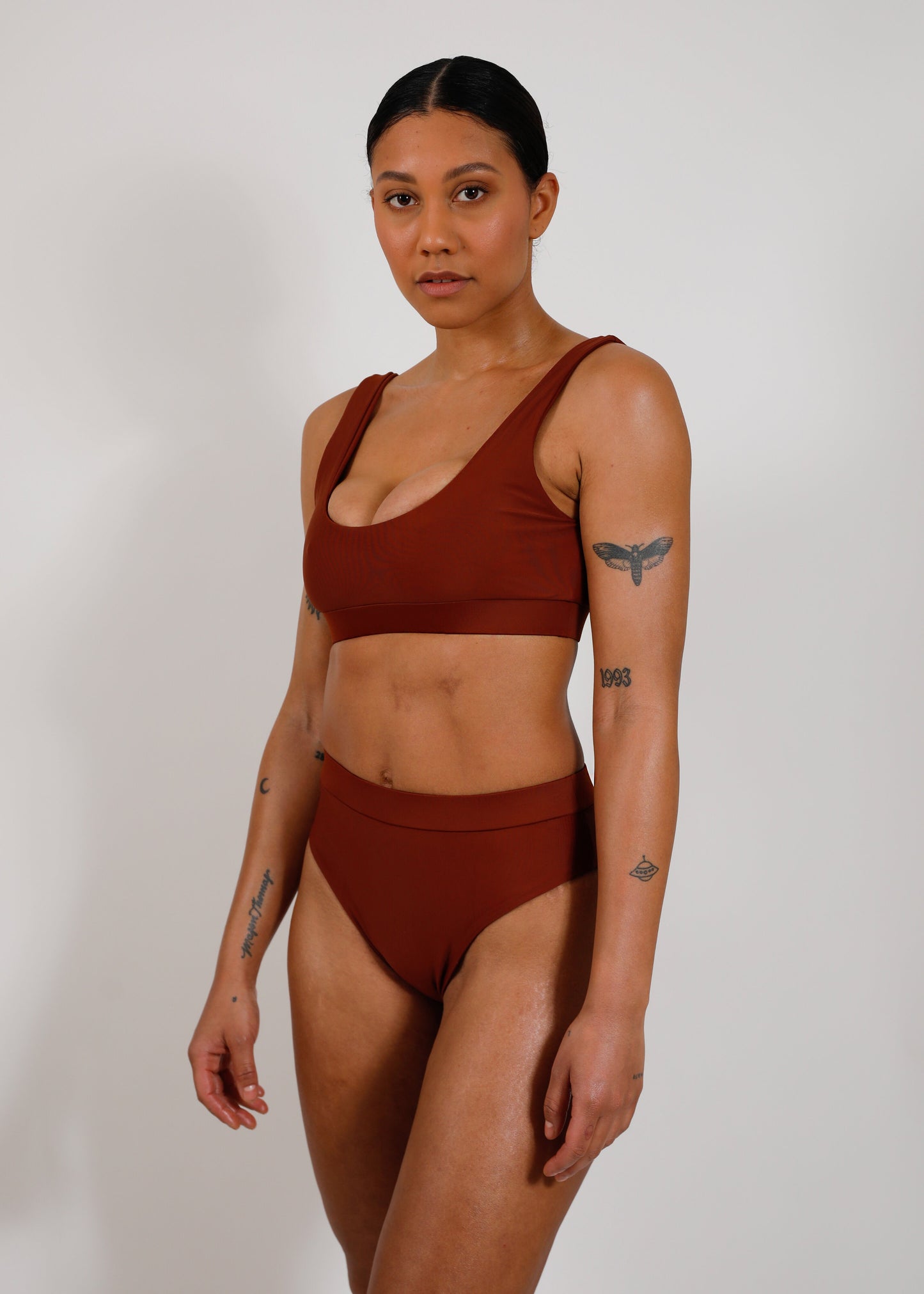 model with sustainable high cut bikini bottom and sporty top