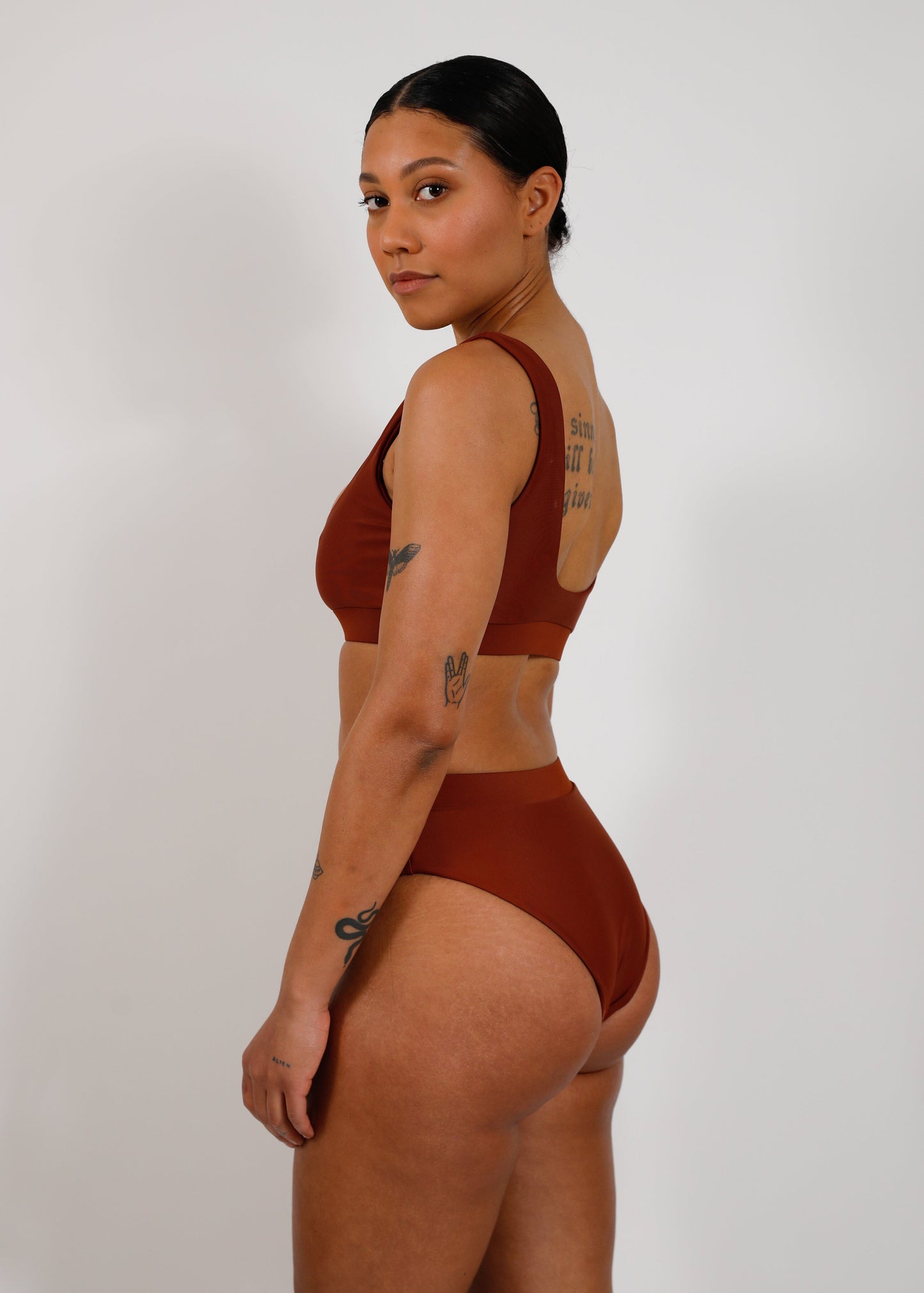model with sustainable high cut bikini bottom and sporty top
