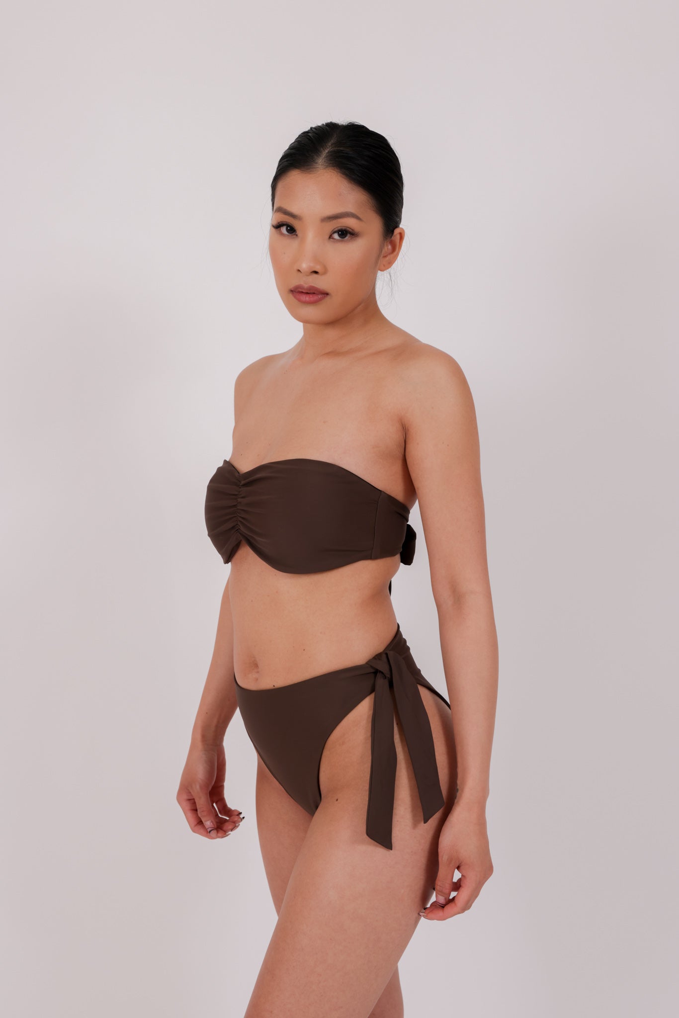 brown strapless bikini in model