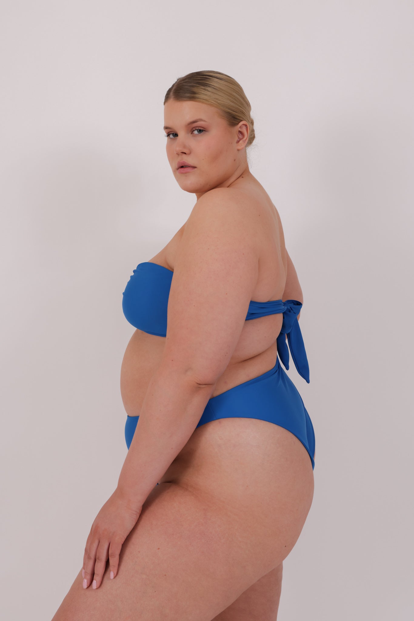 blue bikini in plus size model
