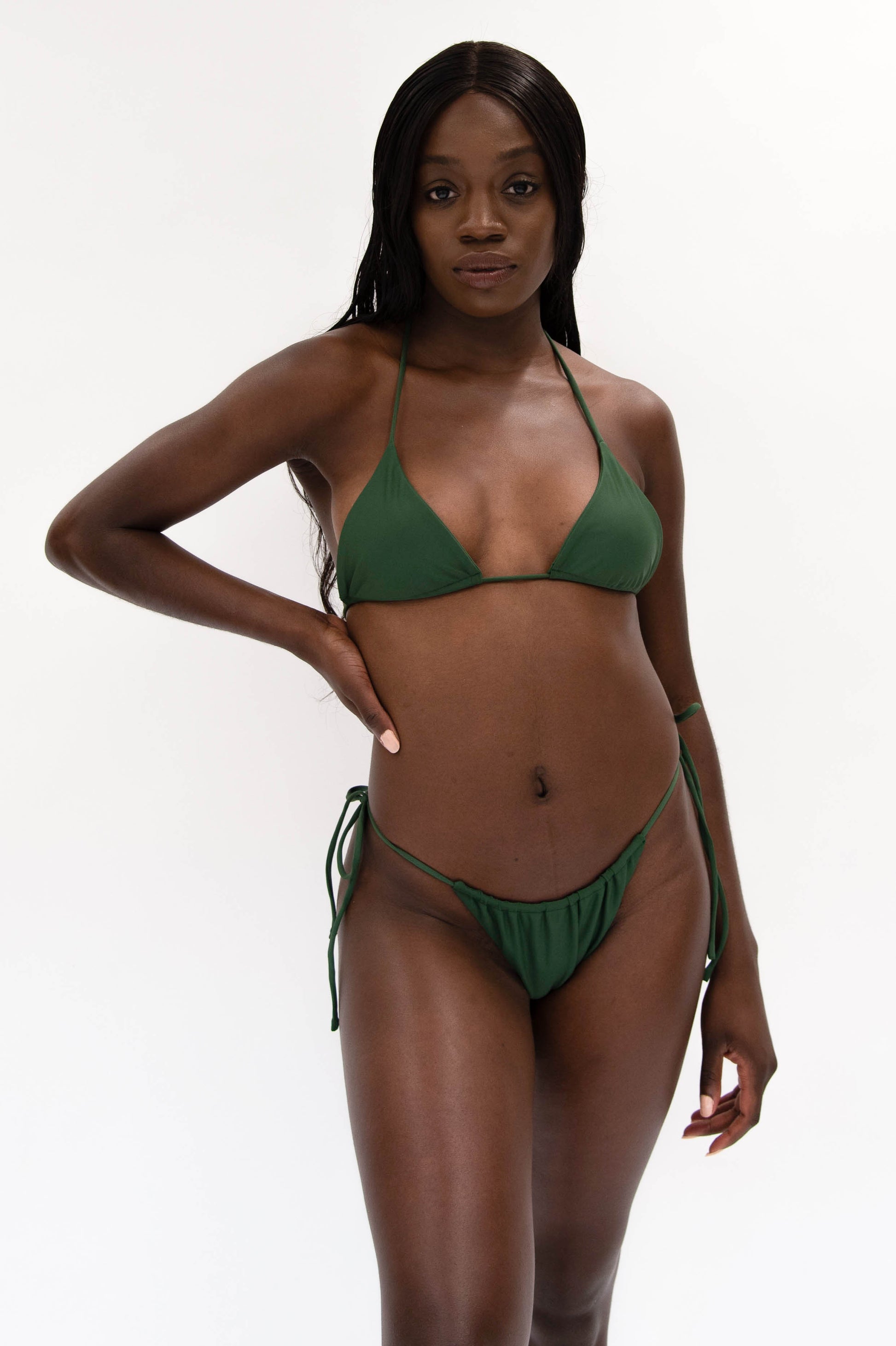 model with sustainable green string bikini