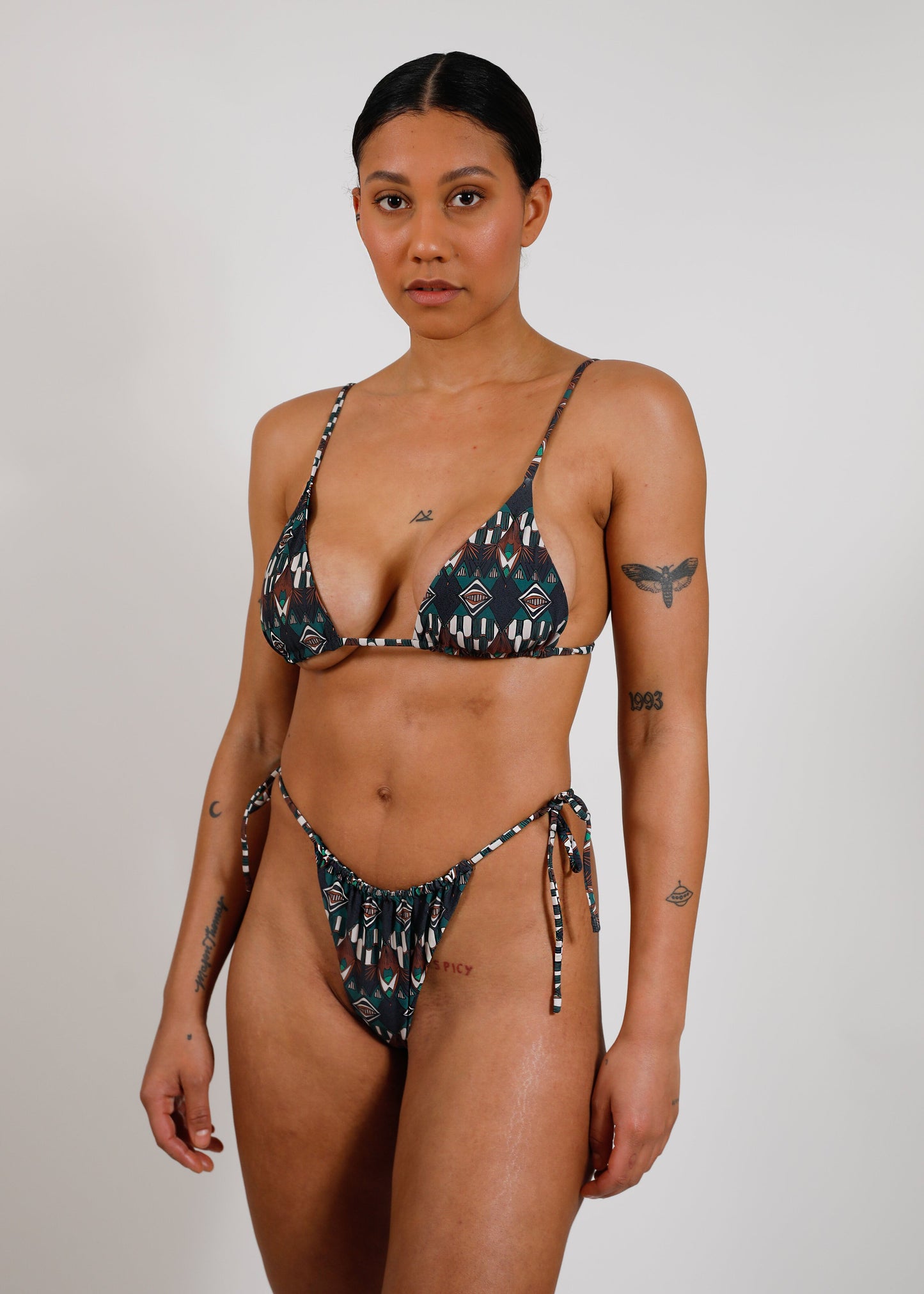 model with sustainable print string bikini